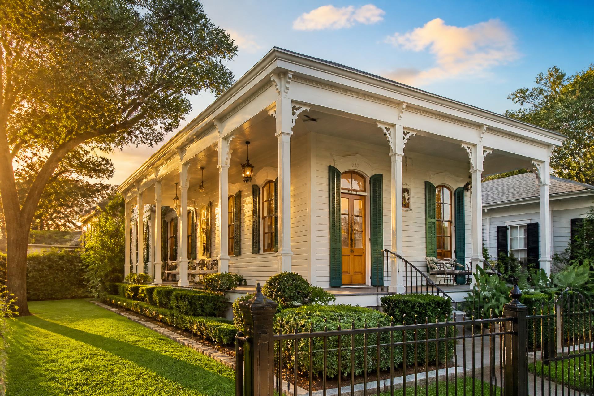 Beautifully staged historic New Orleans home at golden hour